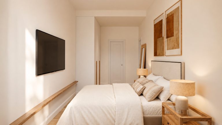 Segundo dormitorio con televisión de la Vivienda C en Plaza Joaquín Costa 16, Calatayud